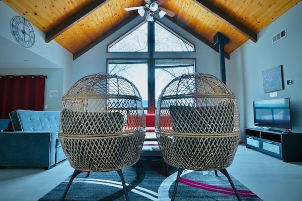 A cozy living room with fantastic views, television, and Sonos for music