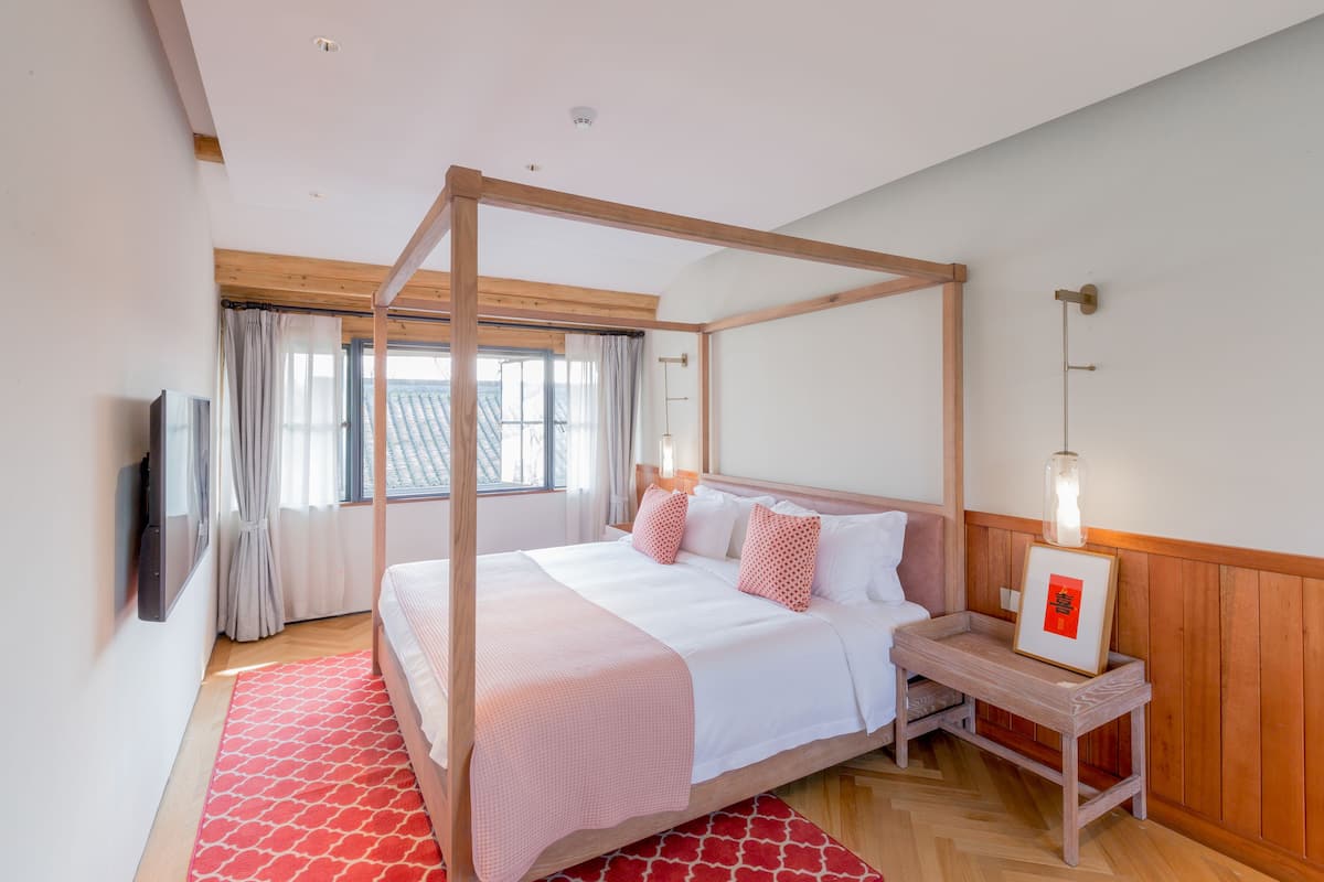 Suite | Cortinas opacas, wifi gratis, ropa de cama