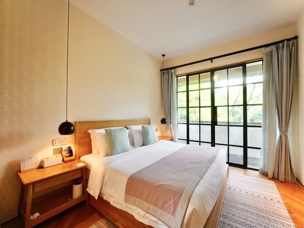 Suite Signature | Ropa de cama de alta calidad, minibar, decoración individual