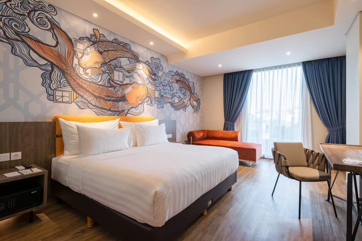 Junior Double Room, 1 Double Bed | Minibar, in-room safe, desk, iron/ironing board