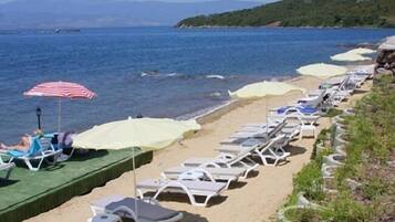 Private beach, sun-loungers, beach umbrellas