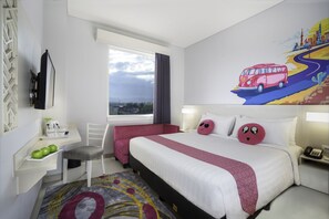 A hotel room with a large bed, a desk with a chair, a window with a view, and a colorful mural on the wall. - favehotel Malang (Malang)