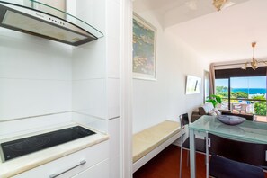 Apartment, 1 Bedroom, Balcony, Partial Sea View | Private kitchen | Full-size fridge, microwave, stovetop, coffee/tea maker