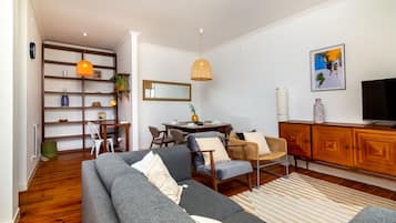 Apartment, 2 Bedrooms, Balcony, City View | Living area | Flat-screen TV