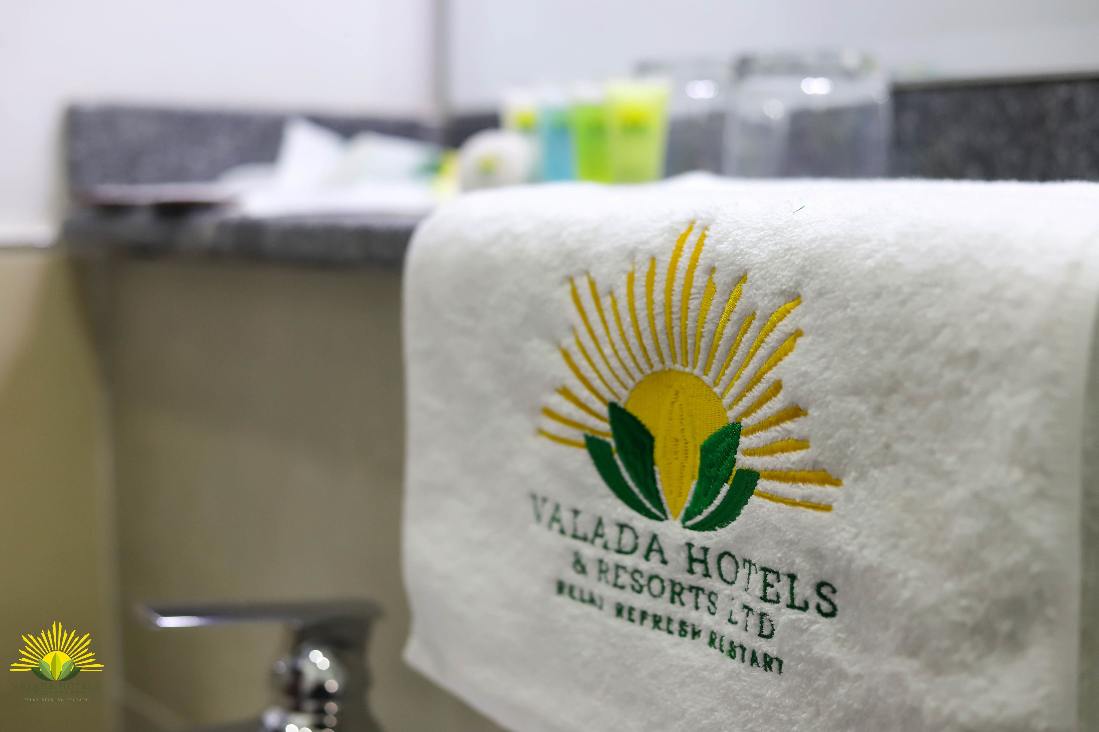 A towel with the logo and name of Valada Hotels & Resorts Ltd.
