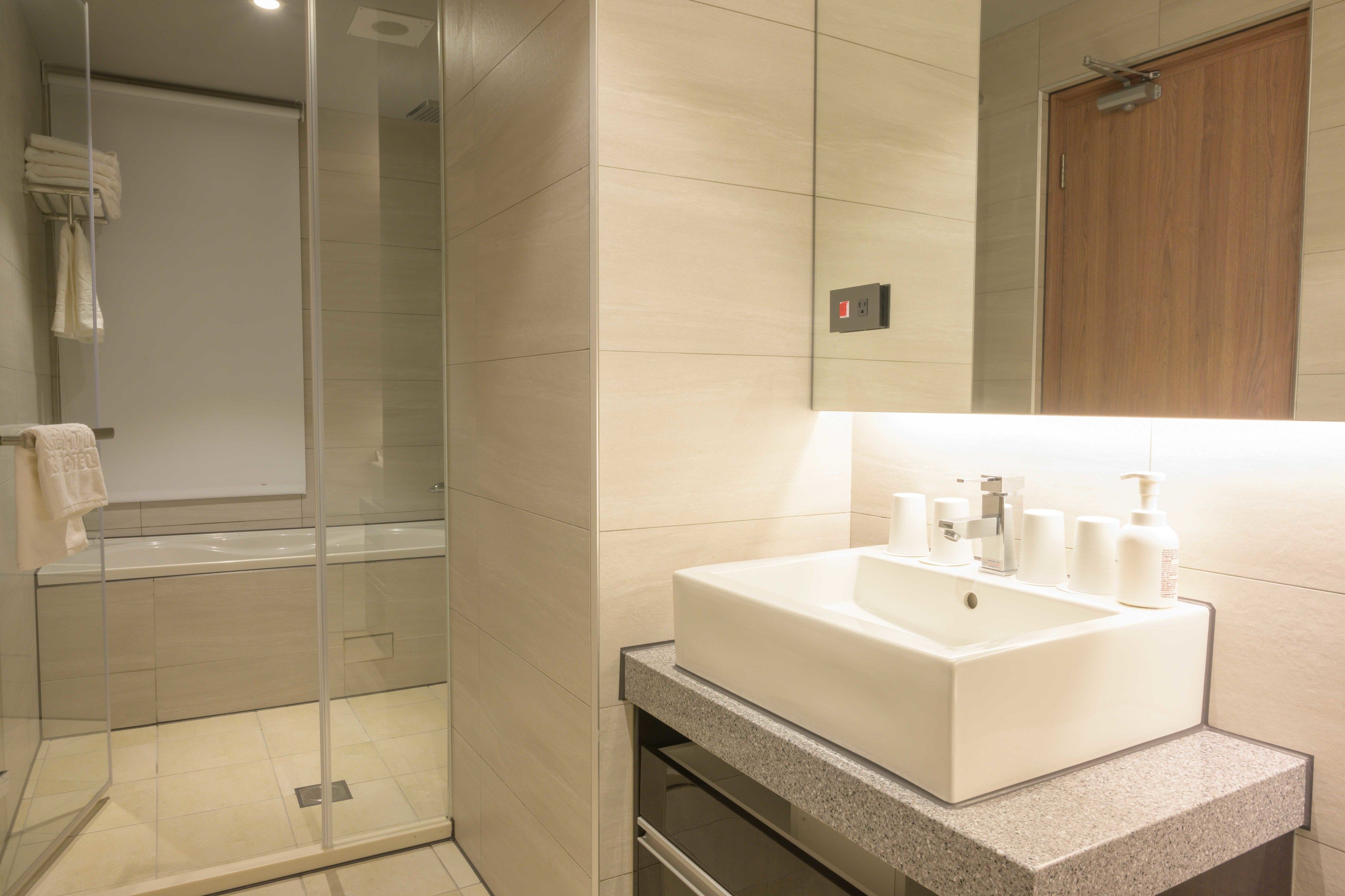 deluxe quadruple room, non smoking | bathroom | free toiletries, hair dryer, slippers, towels