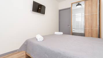 Egyptian cotton sheets, premium bedding, down duvets, minibar