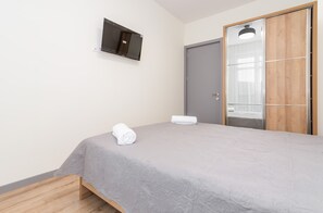 Egyptian cotton sheets, premium bedding, down duvets, minibar