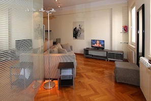 Appartement (Art) | Coin séjour | Télévision à écran plat