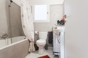 Apartment, 3 Bedrooms | Bathroom | Bathtub, deep soaking tub, free toiletries, hair dryer - Central cozy apartment (Athens)