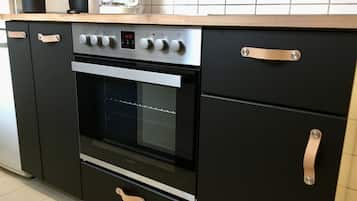Family Apartment | Private kitchen | Full-sized fridge, microwave, oven, stovetop