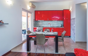 Fridge, stovetop, dishwasher, coffee/tea maker