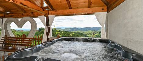 Bañera de hidromasaje al aire libre