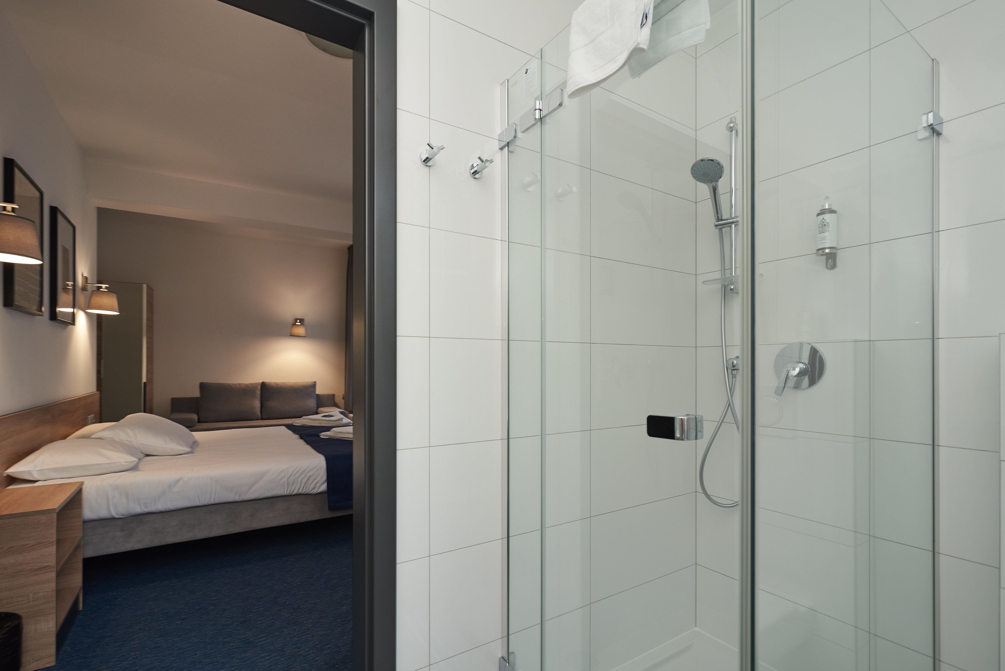 superior double or twin room | bathroom | shower, hair dryer, towels