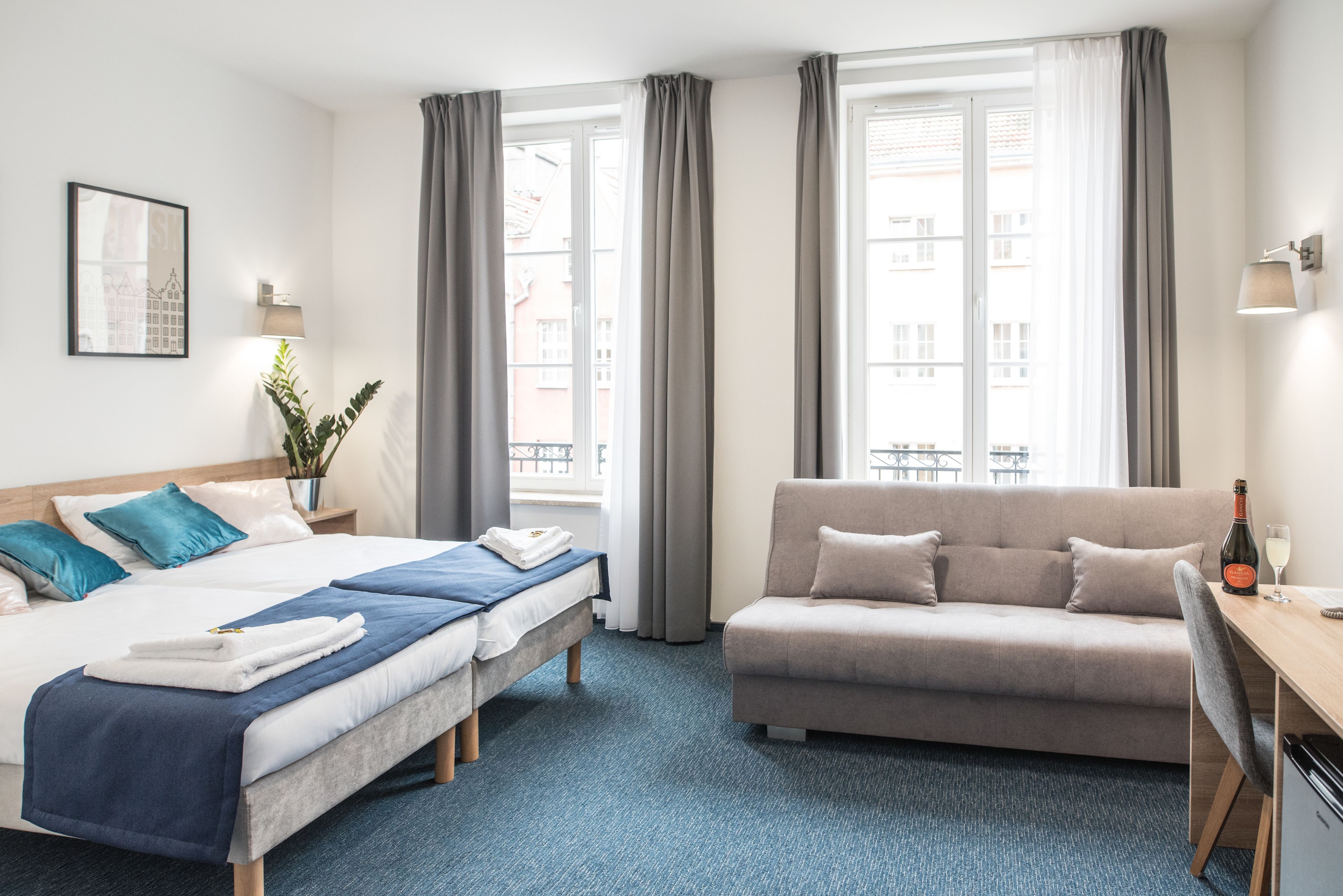 quadruple room | in-room safe, desk, laptop workspace, soundproofing