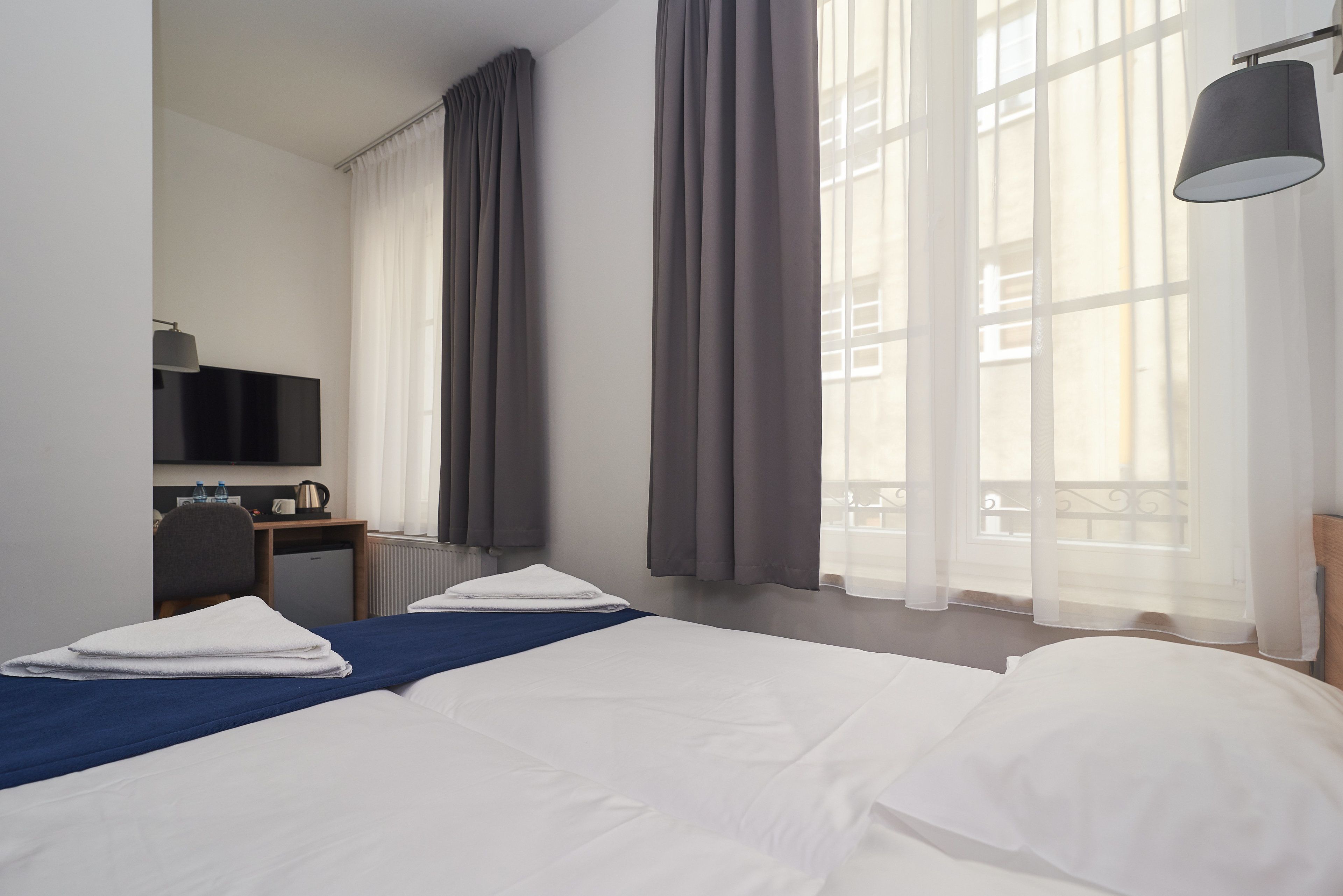 comfort double room | in-room safe, desk, laptop workspace, soundproofing