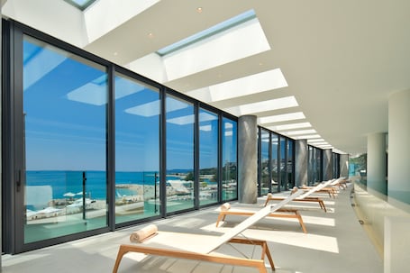 Indoor pool, outdoor pool, pool umbrellas, sun loungers