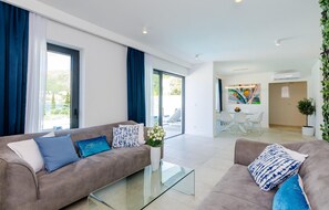 Smart TV, fireplace, DVD player, foosball