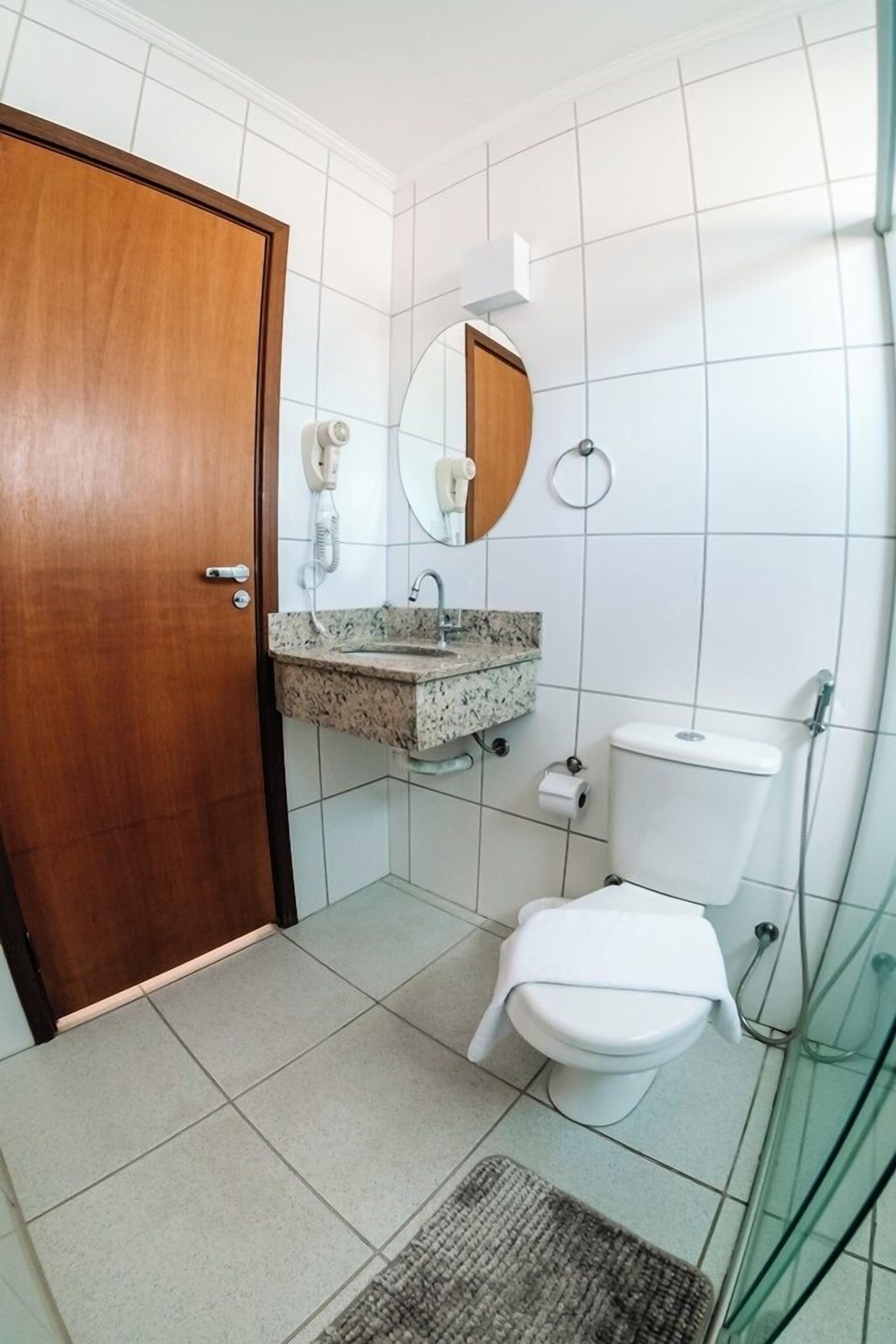 superior double room | bathroom | shower, free toiletries, hair dryer, towels