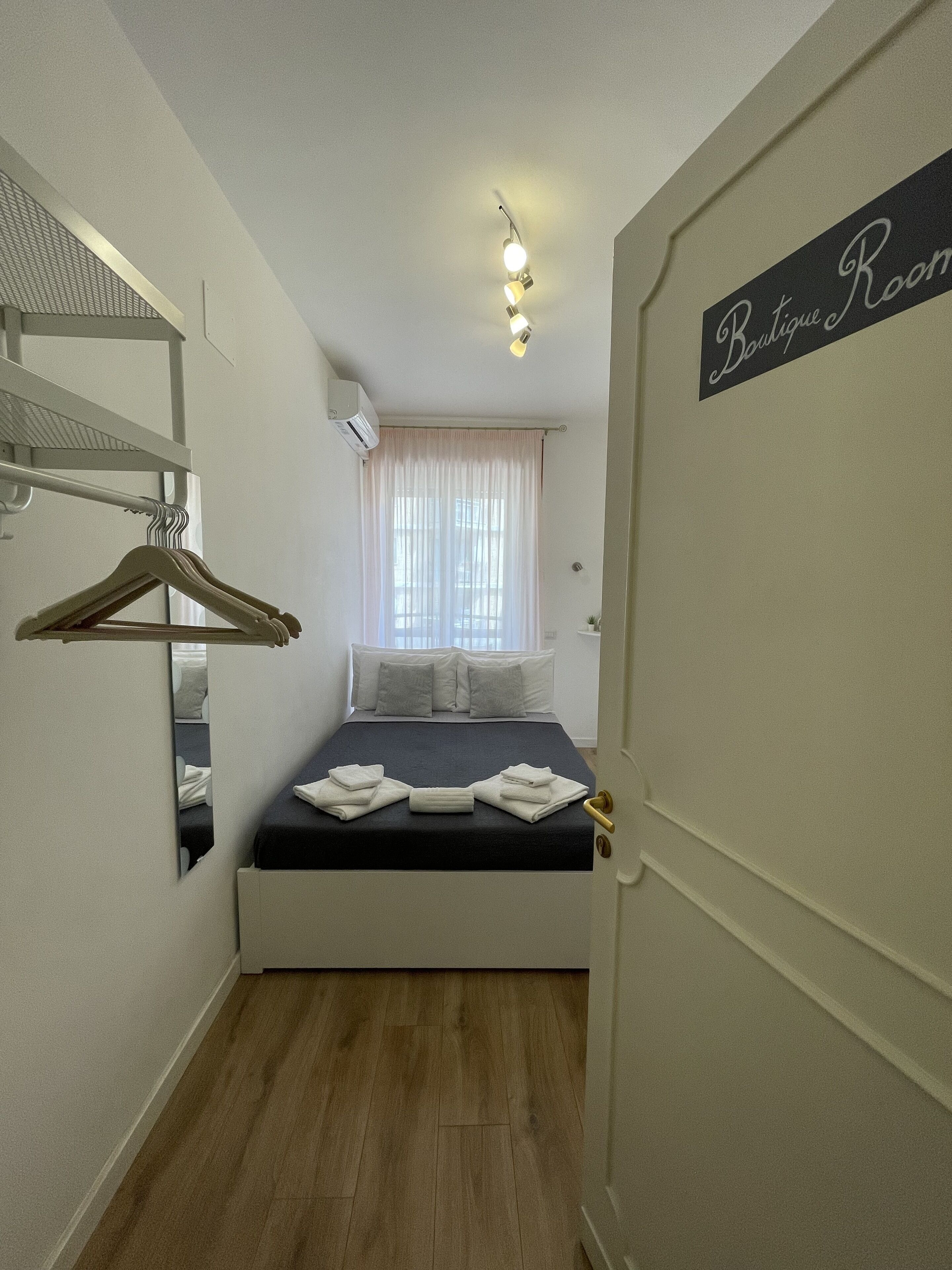 Double Room, Private Bathroom | In-room safe, blackout drapes, iron/ironing board, bed sheets