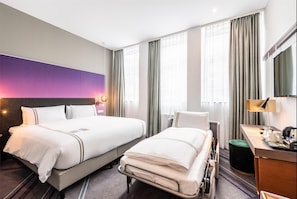 Habitación triple familiar | 1 dormitorio, caja fuerte, sistema de insonorización y wifi gratis