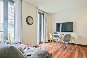 Basic Apartment, 1 Bedroom | Living area | Flat-screen TV
