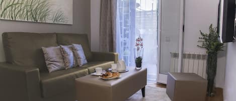 Standard Apartment, 2 Bedrooms, Non Smoking, Terrace | Living area | Flat-screen TV