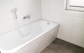 Combined shower/bathtub