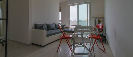 Apartment, 1 Bedroom | Living area | Flat-screen TV