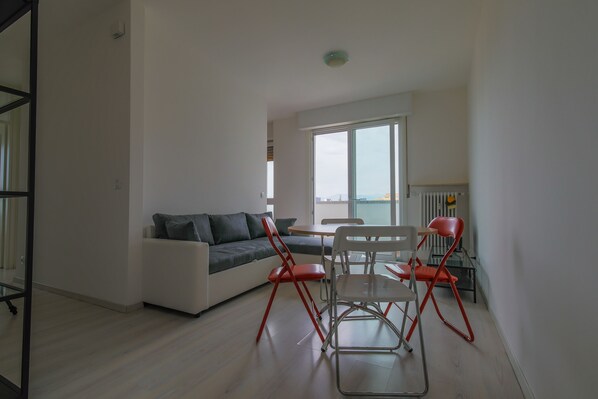 Apartment, 1 Bedroom | Living area | Flat-screen TV - Forni (Udine)