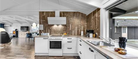 Fridge, stovetop, dishwasher, coffee/tea maker