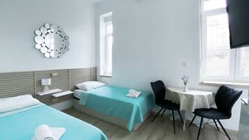 Double Room | Desk, iron/ironing board, free WiFi, bed sheets