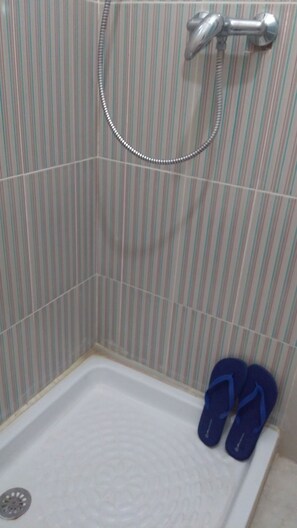 Shower, towels, soap, shampoo