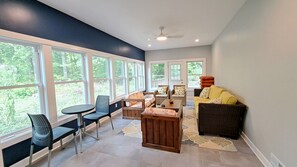 TV, fireplace, books