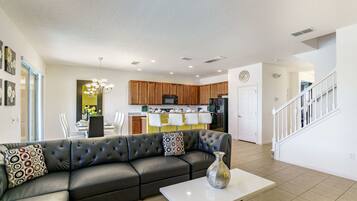 40-inch TV with cable channels, table tennis