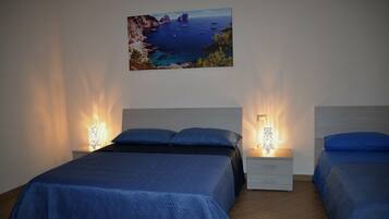 Camera tripla | Materassi in memory foam, una cassaforte in camera