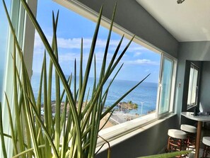 Quarto, várias camas, para não fumantes | Vista para praia/oceano