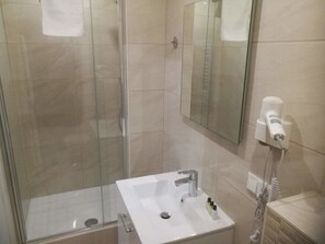 Shower, free toiletries, hair dryer, towels