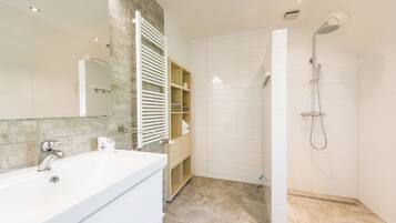 Apartment, 1 Bedroom (Louise) | Bathroom | Shower, rainfall showerhead, free toiletries, hair dryer
