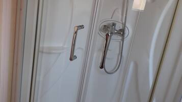 Shower, hair dryer, toilet paper