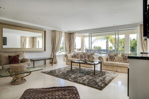 Exclusive Villa, Private Pool | Living room | 55-inch plasma TV with digital channels, TV, fireplace