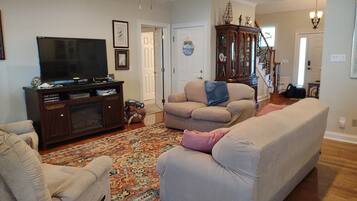 Smart TV, fireplace, table tennis, books