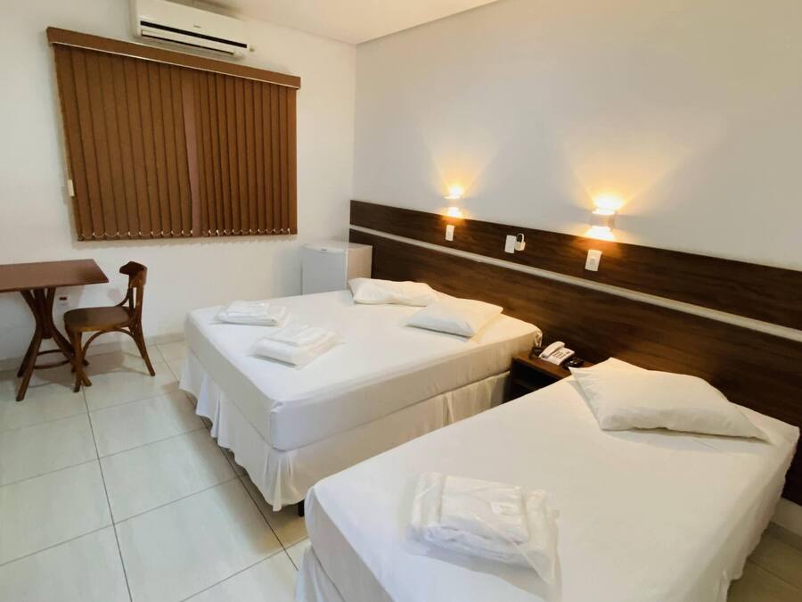 Quarto Triplo Deluxe | In-room safe, blackout drapes, free WiFi, bed sheets