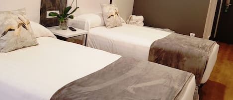 Twin Room | Premium bedding, down duvets, memory-foam beds, blackout curtains