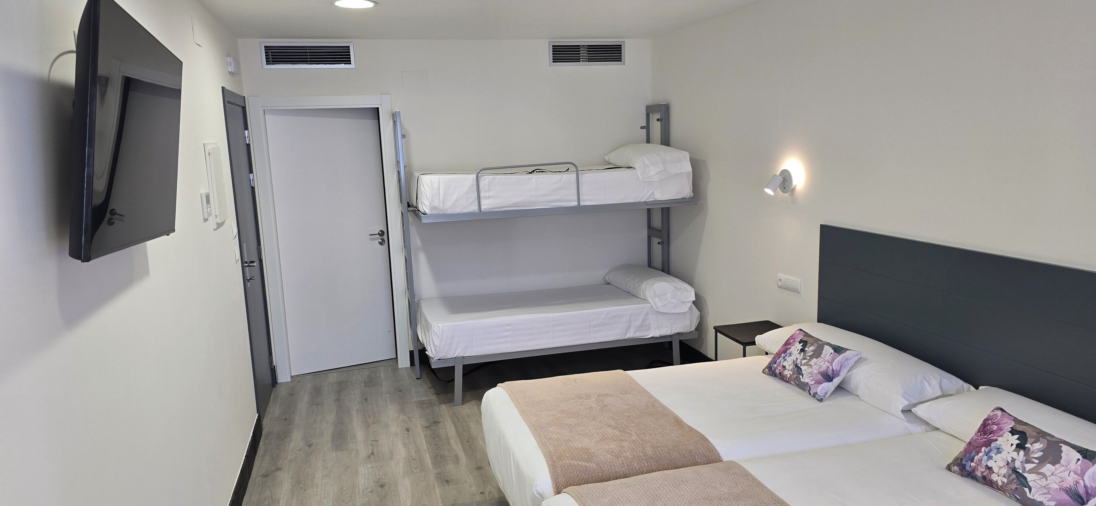 Family Quadruple Room | Premium bedding, down comforters, memory foam beds, blackout drapes