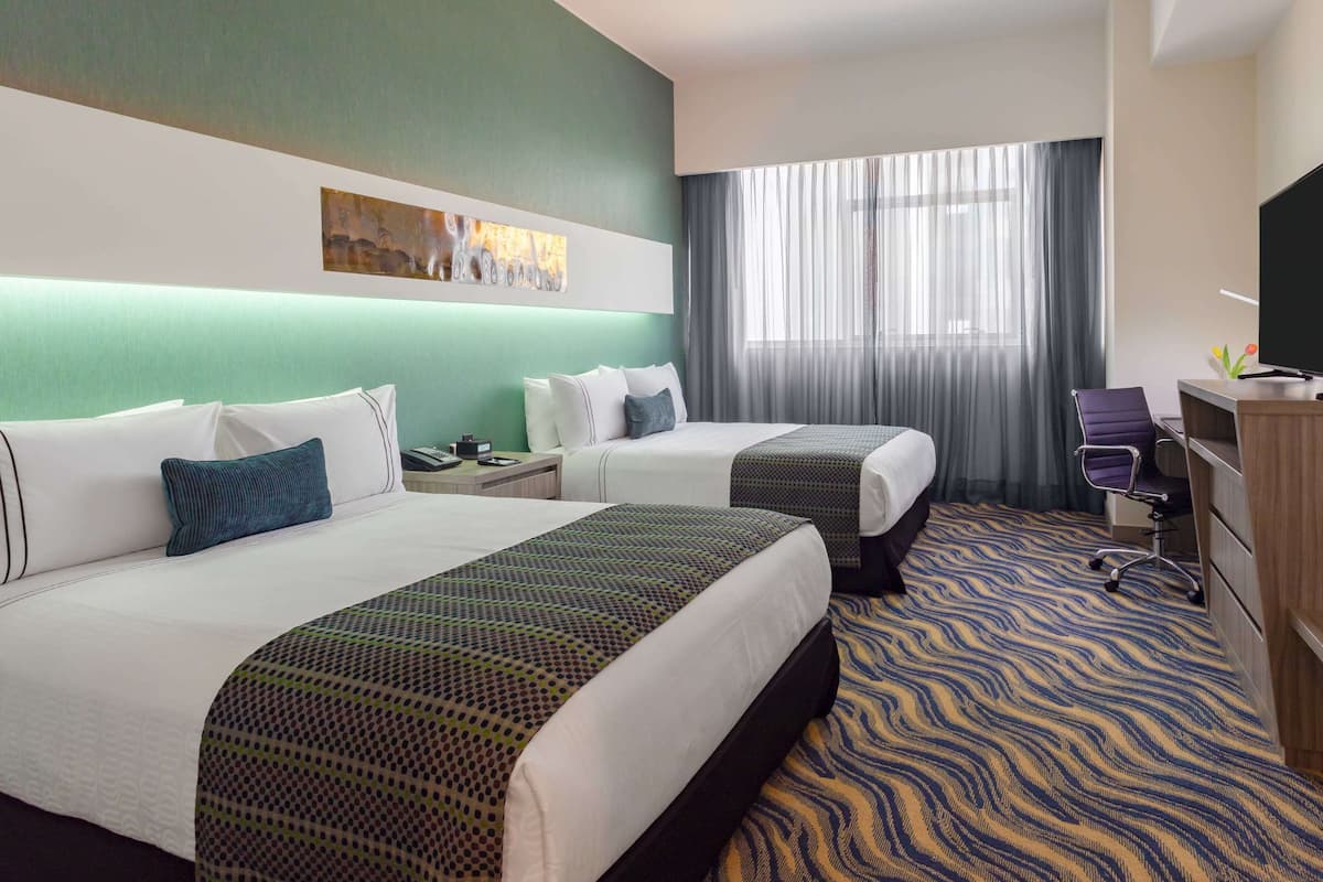 standard room, 2 queen beds | minibar, in-room safe, desk, laptop workspace