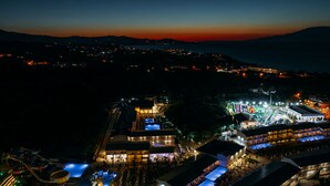 A resort with multiple buildings, outdoor pools, and a water park. - Caretta Paradise Resort & Waterpark (Zakynthos)