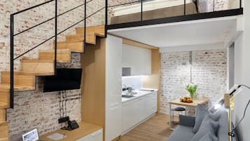 Standard Apartment | In-room safe, desk, laptop workspace, blackout drapes