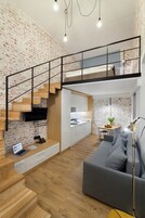 Standard Apartment | In-room safe, desk, laptop workspace, blackout drapes