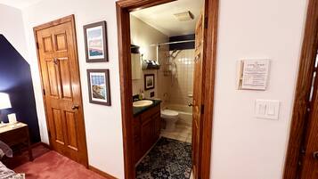 Combined shower/tub, hair dryer, towels, soap